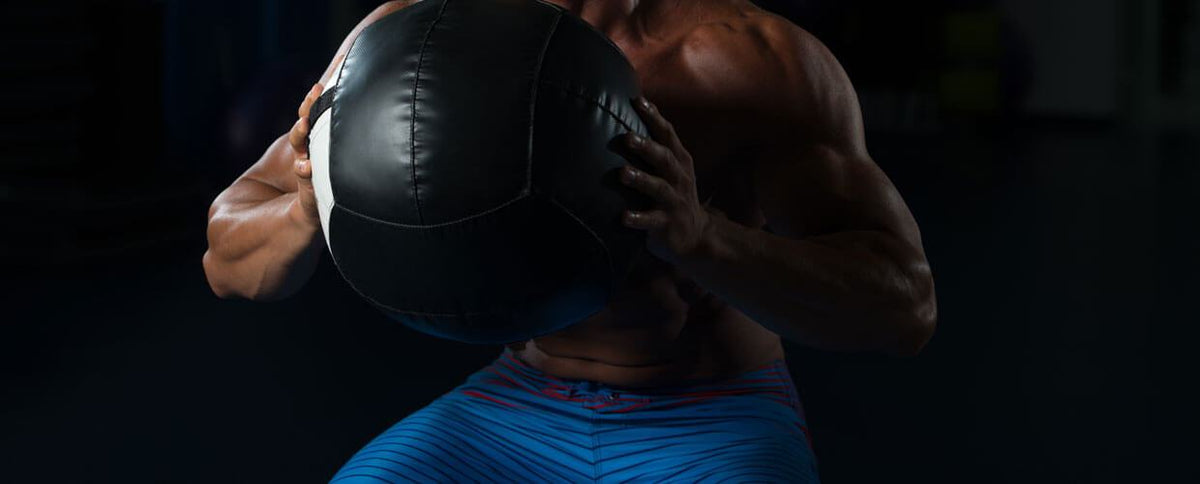 This Creative Slam Ball Workout Will Up-Level Your Bodyweight Routine
